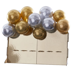 Gold Prosecco Wall With Chrome Balloons