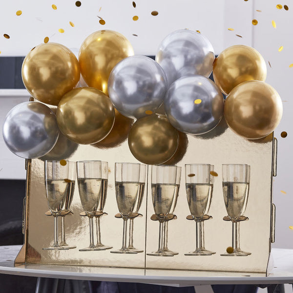 Gold Prosecco Wall With Chrome Balloons